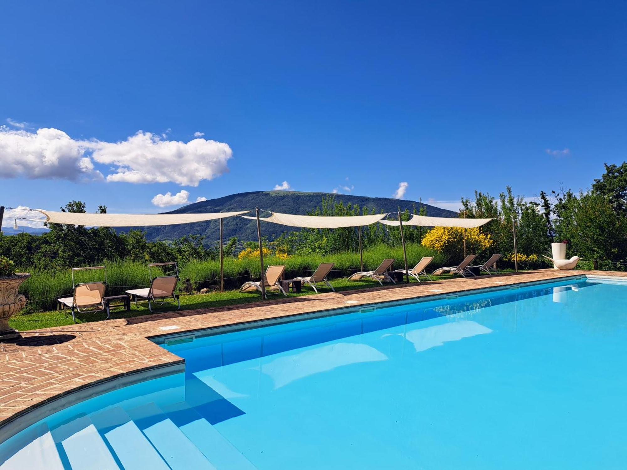 Le Ginestre Apartments Assisi Bagian luar foto